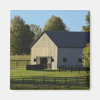 Barn on thoroughbred horse farm at sunrise, magnet