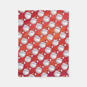 Baseball with Santa Hat on Red Fleece Blanket