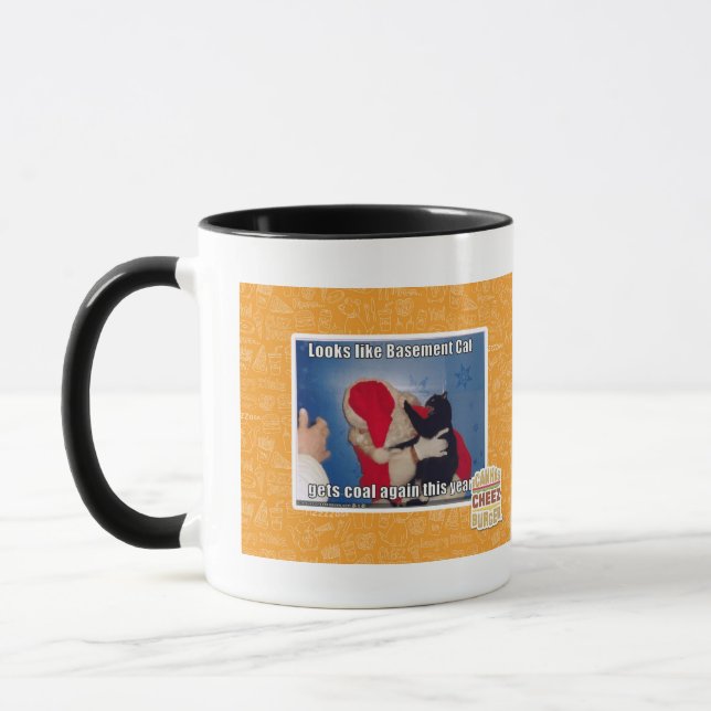 Basement Cat gets coal Mug (Left)