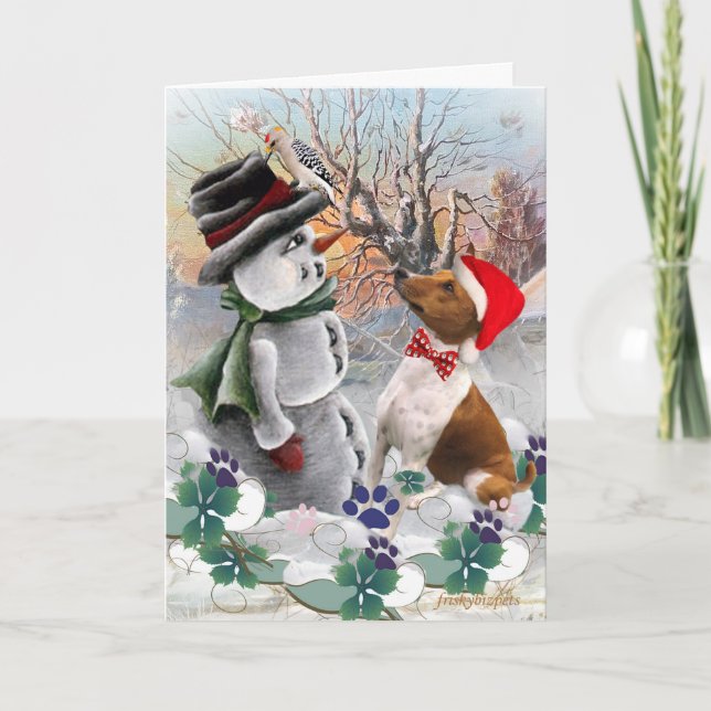 Basenji observe des cartes de bonhomme de neige (Devant)
