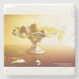 Basket of glass with fruits and batterfly stone coaster