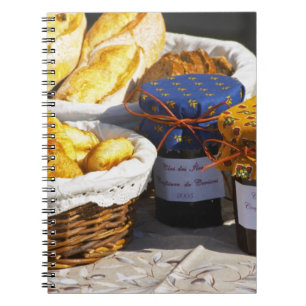 Basket with croissants and chocolate breads. notebook