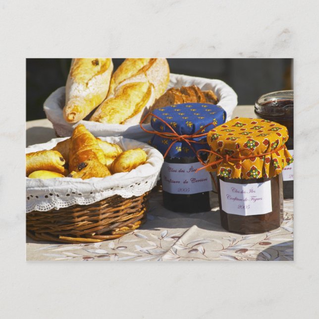 Basket with croissants and chocolate breads. postcard (Front)