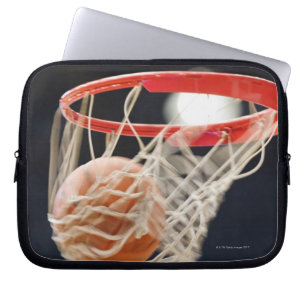 Basketball in basket. laptop sleeve