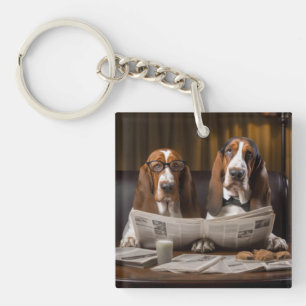 Basset hounds reading the newspaper keychain