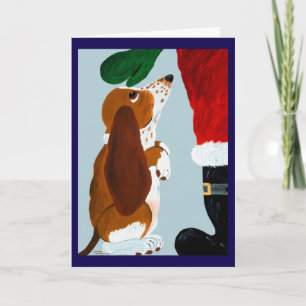 Basset Puppy getting a pet from Santa Card