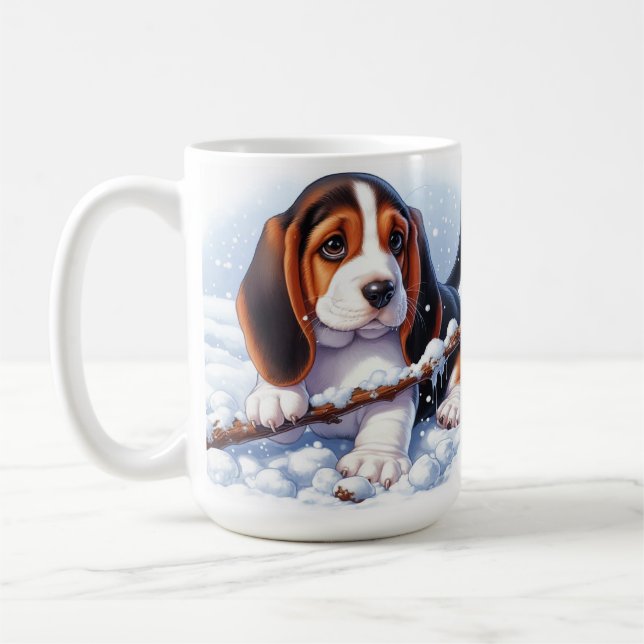 Basset Puppy Playing With a Stick in Winter Snow Coffee Mug (Left)