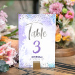 Bat Mitzvah Purple Watercolor Silver Glitter Girly Table Number<br><div class="desc">No Bat Mitzvah party is complete without personalized table number cards. Let your favourite Bat Mitzvah be proud, rejoice and celebrate her milestone at her perfectly coordinated party. Stunning, modern, sparkly silver faux foil handwritten script and tiny dots overlay a light purple watercolor background. Personalize the custom text with the...</div>
