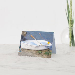 Bateau de rangée avec deux avirons sur la carte