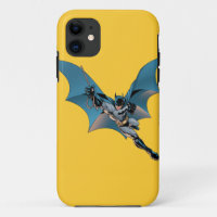 Batman swing  into action