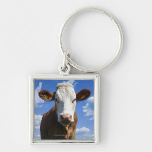 Bavarian cow against blue sky keychain