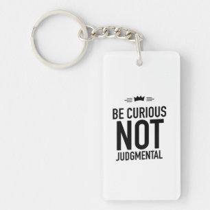 Be curious black keychain