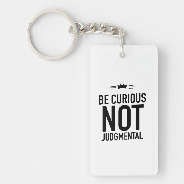 Be curious black keychain (Front)
