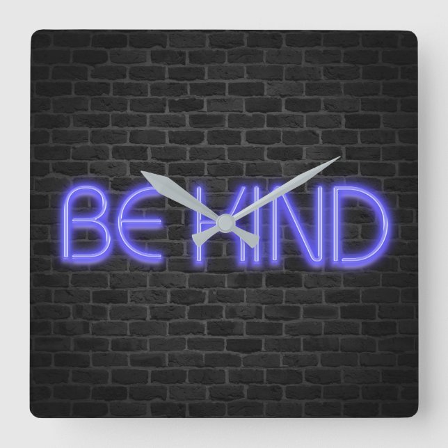 BE KIND text in neon lights on brick Square Wall Clock (Front)