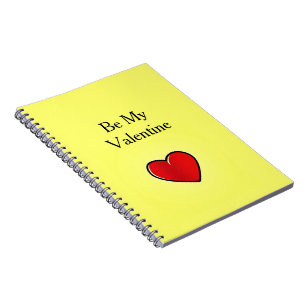 Be my valentine red heart on yellow notebook