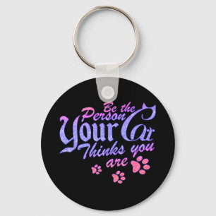 Be the Person Your Cat Thinks You Are Keychain