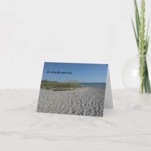 Beach and a lone kayak on a Sympathy Card