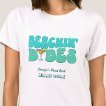 Beach Bachelorette Party Groovy Beachin Babes T-Shirt<br><div class="desc">Make a splash at your upcoming bachelorette party with this stunning beach bachelorette party personalized t-shirts. Whether you're celebrating a bach trip, a girls' vacation, or a best friends' holiday, this custom beach bachelorette party t-shirts are the perfect addition to your unforgettable getaway. Add a personal touch to your bachelorette...</div>