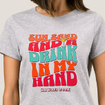 Beach Bachelorette Party Groovy Sun Sand Drink T-Shirt<br><div class="desc">Make a splash at your upcoming bachelorette party with this stunning beach bachelorette party personalized t-shirts. Whether you're celebrating a bach trip, a girls' vacation, or a best friends' holiday, this custom beach bachelorette party t-shirts are the perfect addition to your unforgettable getaway. Add a personal touch to your bachelorette...</div>