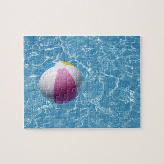 Beach ball in swimming pool jigsaw puzzle (Horizontal)