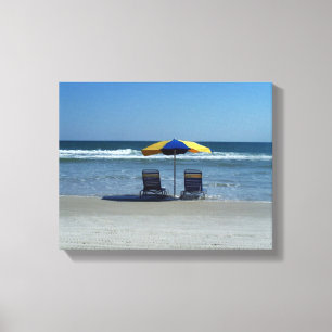 Beach Chairs on The Shoreline Canvas Print