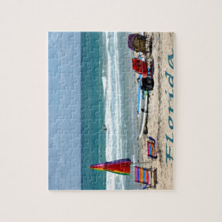 beach chairs surfboards umbrellas sand ocean jigsaw puzzle