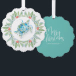 Beach Christmas Sea Turtle Ornament Card<br><div class="desc">This beach Christmas ornament features a watercolor sea turtle encircled by a wreath of greenery and red berries. The ornaments reverses to feature the words "Merry Christmas" in hand lettered typography over a turquoise blue background. Use the template fields to add your custom greeting. A charming choice for gift giving...</div>