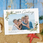 Beach Christmas Starfish Seas N Greetings Photo Holiday Card<br><div class="desc">This coastal themed tropical beach Christmas card features a photo template framed in 2 corners with starfish decorated with holly leaves,  berries,  and pine sprigs,  with the beachy holiday greeting “seas n’ greetings” in modern handwriting script.</div>