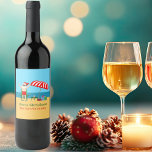 Beach Christmas Summer Santa Claus Custom Party Wine Label<br><div class="desc">This cute custom Christmas in July wine label makes perfect summer party decor for a beach bash or pool gathering. Make it a fun north pole themed extravaganza with Santa Claus in his swimming trunks next to a red and white striped beach umbrella and gifts. I've never seen Mr. Klaus...</div>