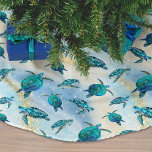 Beach Christmas Watercolor Sea Turtle Glitter Brushed Polyester Tree Skirt<br><div class="desc">Add a coastal touch to your holiday decorating with this tropical beach sea turtle tree skirt, featuring a pattern of cute turquoise blue sea turtles on an abstract beach background with a faux glitter wave and sparkly star accents. Check out the collection for more matching products, or contact me through...</div>