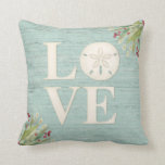 Beach Coastal Christmas Sand Dollar Love Throw Pillow<br><div class="desc">A Christmas throw pillow Showcasing the word LOVE. Decorated with a sand dollar,  beach grasses,  berries and a weathered wood background for your Christmas Beach decor.</div>