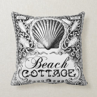 beach cottage with sea shells black_white cushion