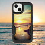 Beach Dog in California Surf Personalized<br><div class="desc">A dog plays in the Pacific surf as the last golden rays of the sun slide over the mountains and turn the beach golden. This OtterBox case features a photo of a California beach at sunset so you can take a bit of surf and sand with you wherever you go....</div>