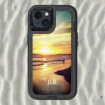 Beach Dog in Surf<br><div class="desc">A dog plays in the Pacific surf as the last golden rays of the sun slide over the mountains and turn the beach golden. This OtterBox case features a photo of a California beach at sunset so you can take a bit of surf and sand with you wherever you go....</div>