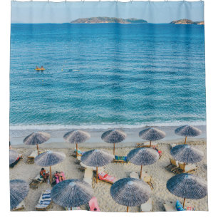 Beach lounge on seashore facing the sea