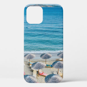 Beach lounge on seashore facing the sea iPhone 12 case
