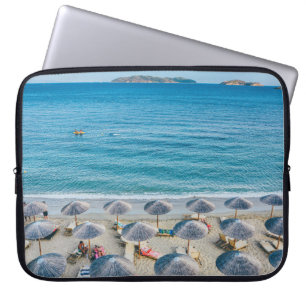 Beach lounge on seashore facing the sea laptop sleeve