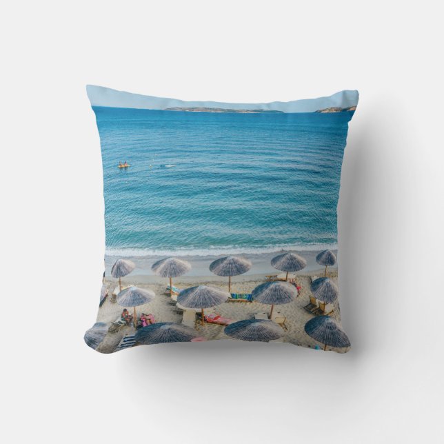 Beach lounge on seashore facing the sea throw pillow (Front)
