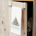Beach Merry Christmas Tree Kitchen Towel<br><div class="desc">Bring some coastal holiday cheer to your kitchen with this festive Christmas towel featuring a seashell Christmas tree topped with a starfish. Inspired by the beachy vibes of places like Hawaii, Florida, and the Bahamas, this design adds a relaxed yet cheerful touch to your seasonal kitchen decor. The watercolor artwork...</div>