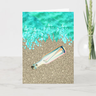 Beach message in bottle shoreline ocean sand card