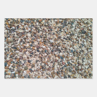 Beach pebbles and shells pattern wrapping paper sheet