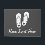 Beach theme door mat with flip flops and quote<br><div class="desc">Beach theme door mat with flip flops and quote. Home sweet home. Make your own custom indoor / outdoor doormat with custom background colour and saying. Add your own welcome message, family name, monogram, surname or funny quote. Cute gift idea for new home / housewarming, wedding venue, beach front store,...</div>