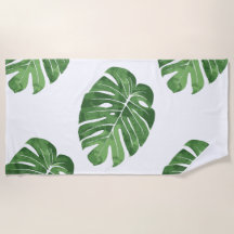 Beach towel with tropical leaves print