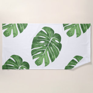 Beach towel with tropical leaves print