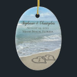 Beach Wedding Hearts in the Sand Elegant Ceramic Ornament<br><div class="desc">Two interlocking beach wedding hearts drawn in the sand makes an elegant tropical ocean coastal nautical theme wedding,  matching set of items. Pretty turquoise water waves crashing on the shore and pastel blue sky.</div>