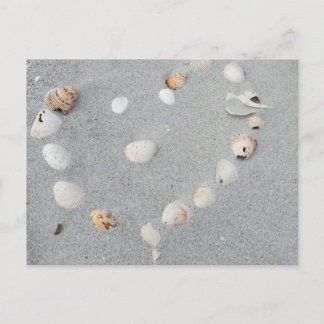 Beach with Heart made out of shells. Postcard