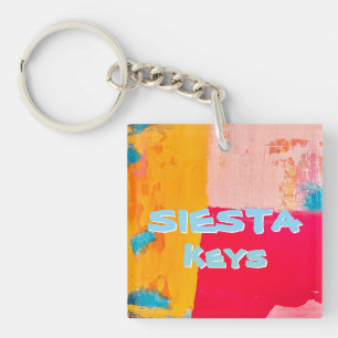 Beachy key chain says “Siesta keys”