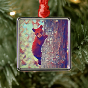 Bear cub climbing tree metal ornament