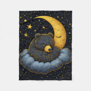 Bear nestled in a fluffy cloud fleece blanket