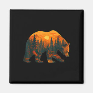 Bear silhouette with forest landscape and sunset magnet